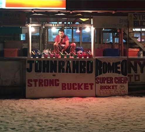 Many of the bucket booths have people's names on them, like Johnrambo and Anna (but we wouldn't have gone to Anna because she was tweezing her leg hairs over the buckets). 